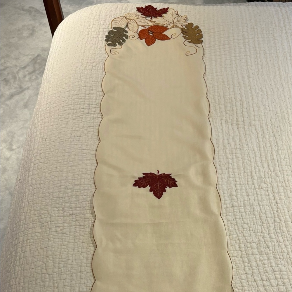 Table runner with appliqué fall leaves
